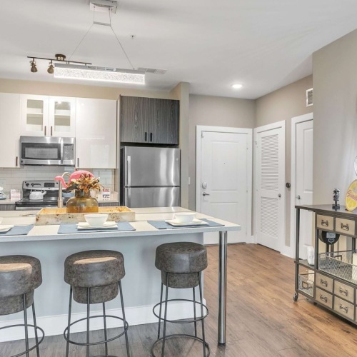 Bar stools kitchen counter and cabinets